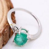 Natural Emerald Oval Shaped Gemstone With Diamond Ring In 14k White Gold