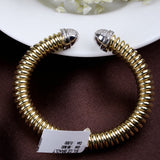 Gold Plated Coil Bracelet with CZ Dome Ends Elegant Designer Cuff Bangle