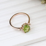 Natural  Peridot Rose Gold Plated Ring with CZ Side Stones Three Stone Design