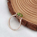 Natural  Peridot Rose Gold Plated Ring with CZ Side Stones Three Stone Design
