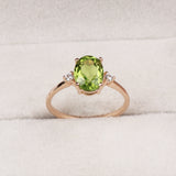 Natural  Peridot Rose Gold Plated Ring with CZ Side Stones Three Stone Design