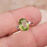 Natural  Peridot Rose Gold Plated Ring with CZ Side Stones Three Stone Design